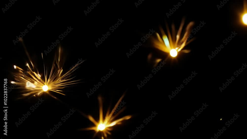Glowing Sparklers in Darkness with Dynamic Light Bursts Glowing Sparklers in Darkness with Dynamic Light Bursts