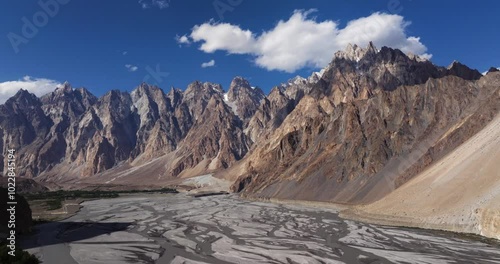 Backward Drone Shot - Passu Cones Mountains. Hunza River, Pakistan photo