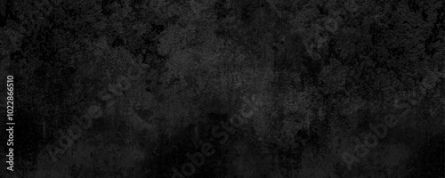 Rough dark textured background with gritty surface details ideal for industrial-style branding and web design 