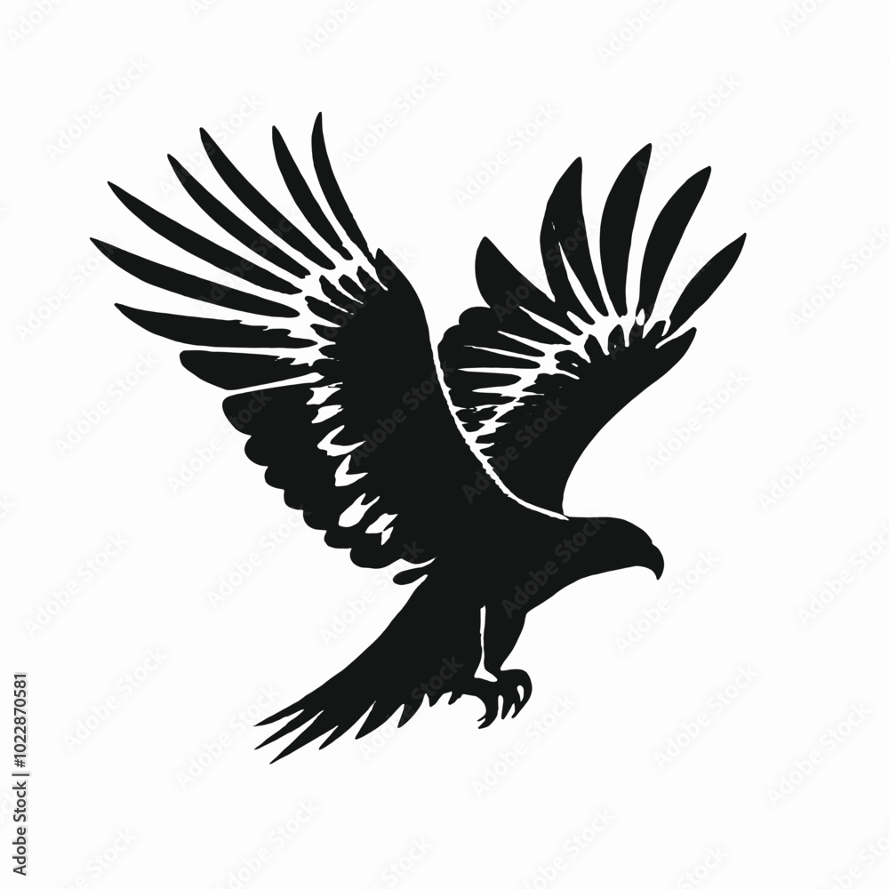 Obraz premium A black and white silhouette of a flying bird with outstretched wings 