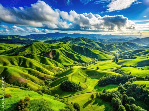 Vibrant Telegenic Landscape with Lush Green Hills, Clear Blue Sky, and Serene Atmosphere for Relaxation photo