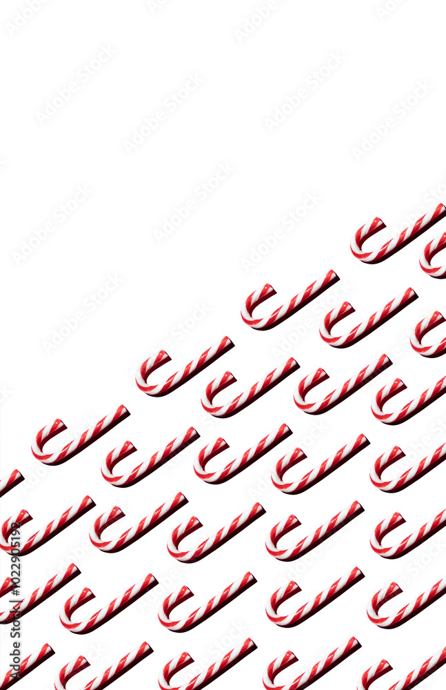 Top view of assorted red and white candy canes on white background vertical composition with copy space