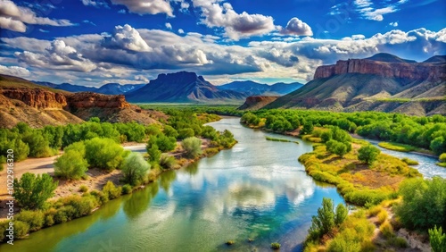 Majestic Rio Grande River Flowing Through Stunning Landscapes with Lush Vegetation and Mountains