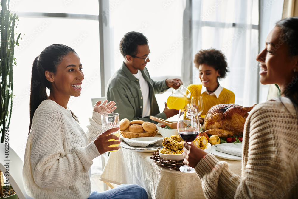 Friends share laughter and delicious food during a warm Thanksgiving celebration at home. Friends share laughter and delicious food during a warm Thanksgiving celebration at home.
