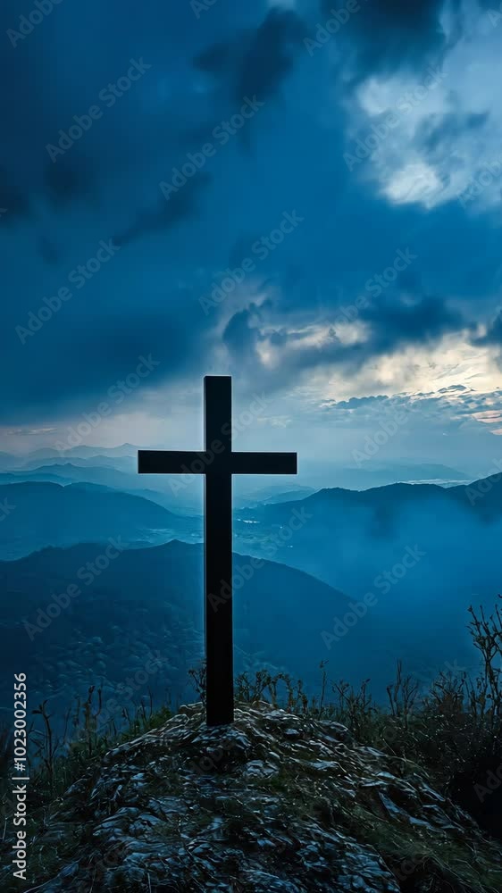 Silhouette of a cross on mountain at dusk, scenic view. Spirituality and tranquility concept Silhouette of a cross on mountain at dusk, scenic view. Spirituality and tranquility concept