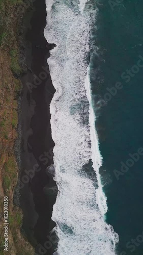 Drone Aerial View of Ocean Waves on Rocky Coastline