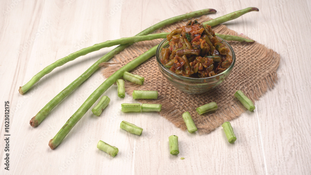 French beans with stewed green peas on wooden background. Healthy food concept. French beans with stewed green peas on wooden background. Healthy food concept.