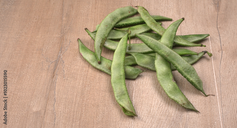 Pile of green beans over wooden background, Healthy food concept Pile of green beans over wooden background, Healthy food concept