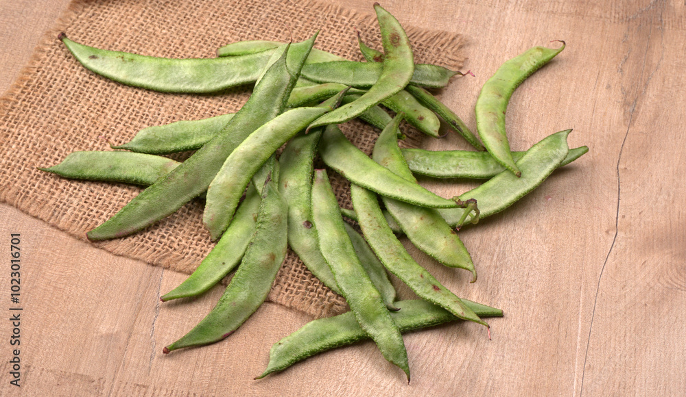 Pile of green beans over wooden background, Healthy food concept Pile of green beans over wooden background, Healthy food concept