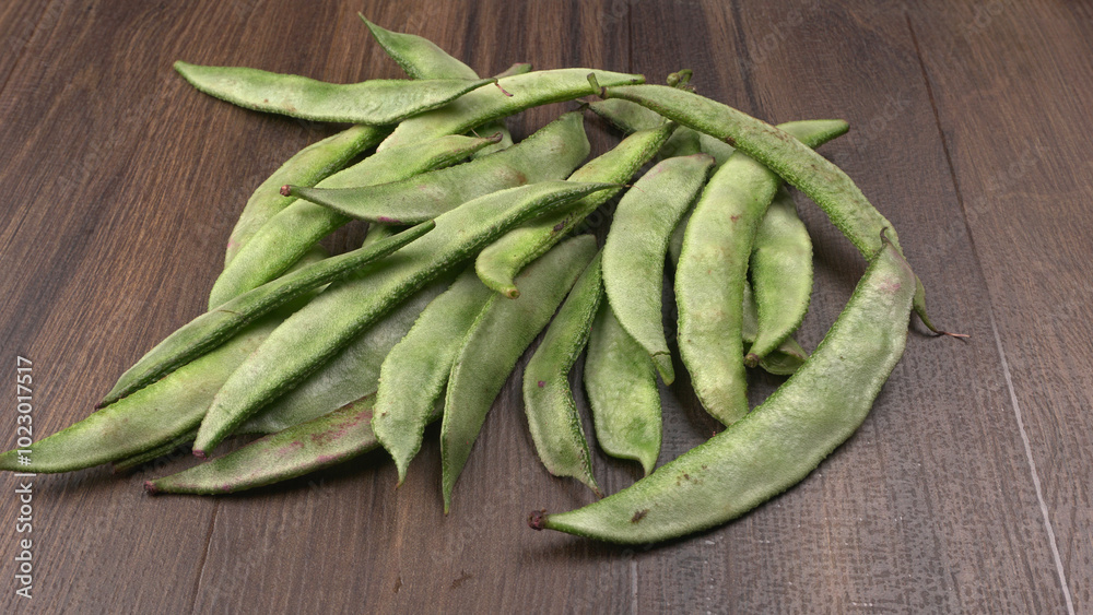 Pile of green beans over wooden background, Healthy food concept Pile of green beans over wooden background, Healthy food concept