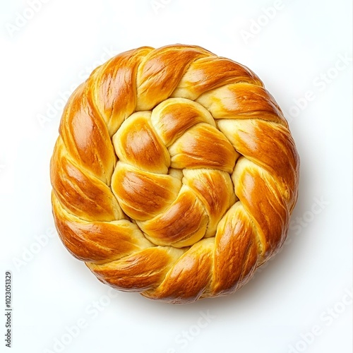 Golden braided bread, isolated on white background, top view. photo