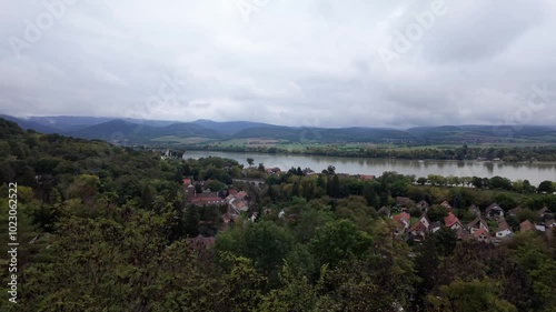 Landscape view of the bend of the Danube, Duna-Ipoly National Park, and Pilis Mountains on a fall overcast day from Zebegeny, Hungary. photo