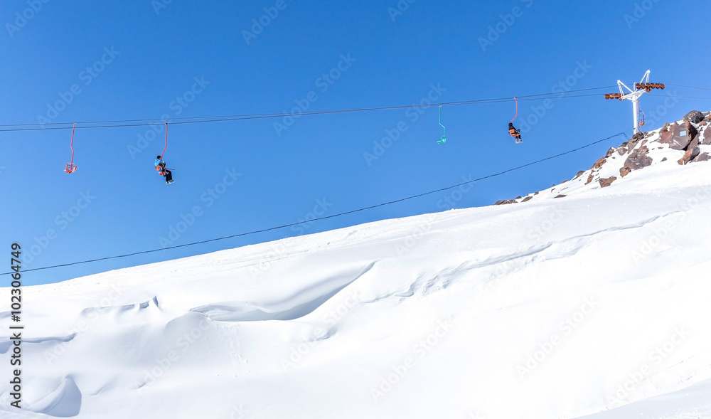 Ski lift in Ski Resort high in the mountains Ski lift in Ski Resort high in the mountains