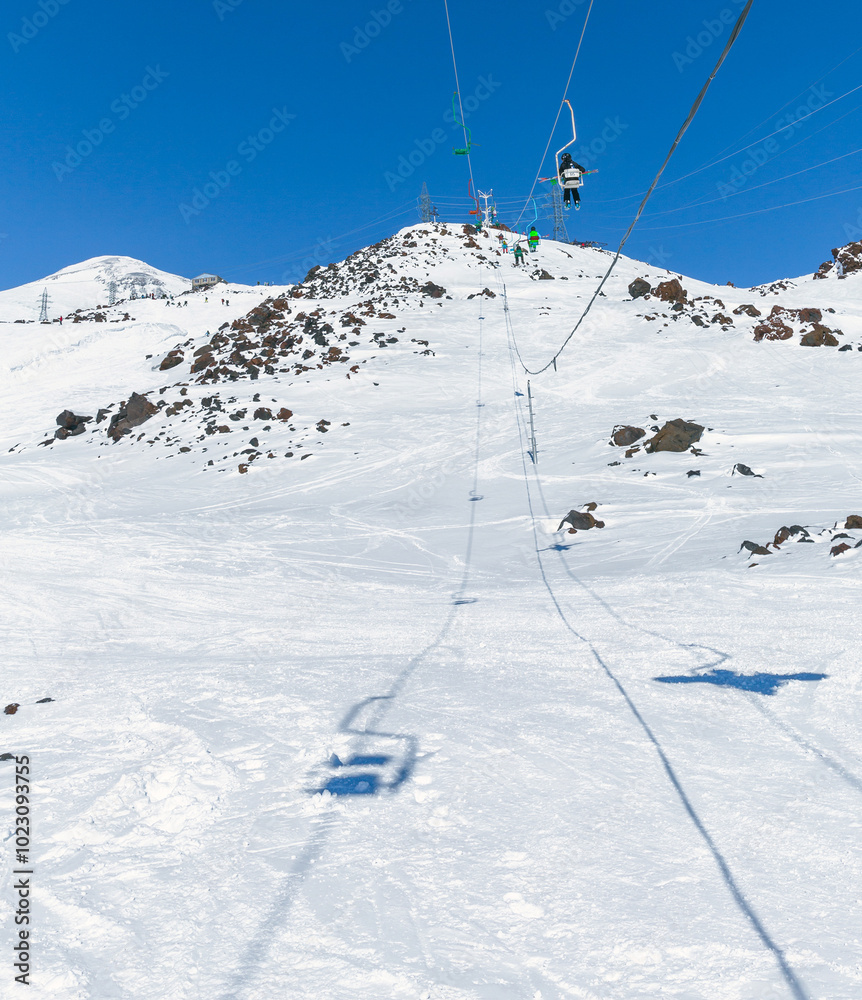 Ski lift in Ski Resort high in the mountains Ski lift in Ski Resort high in the mountains