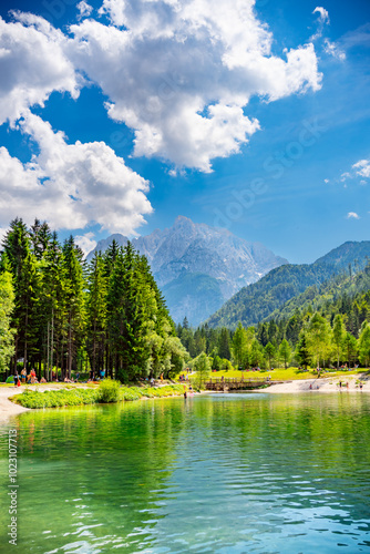 Fototapeta Naklejka Na Ścianę i Meble -  Slovenia, vertical picturesque view of beautiful lake Jasna and Alps mountains. High quality photo