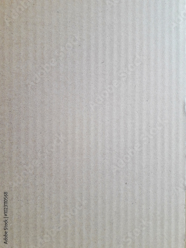 Textured background, brown corrugated cardboard sheet surface