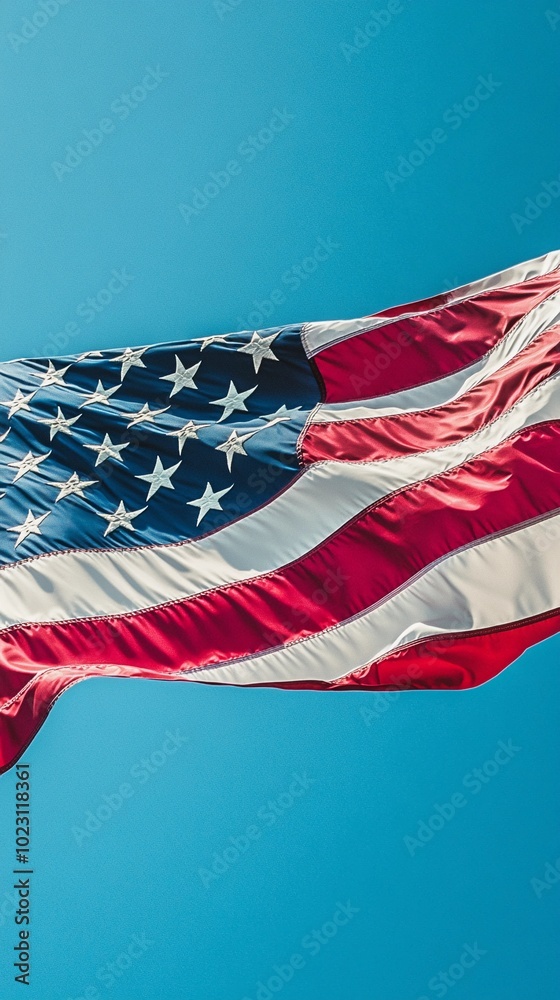 background featuring the American flag, flowing in the wind with space for text, vibrant colors, patriotic, simple and clean design, bright lighting, clear blue sky in the background