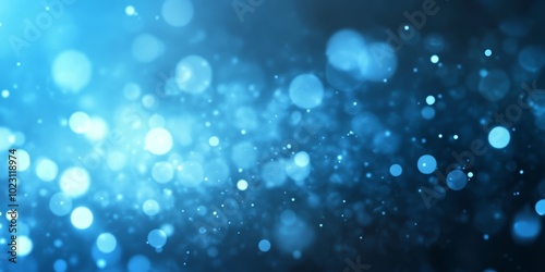 Abstract blue bokeh with shimmering lights creating a dreamy atmosphere.