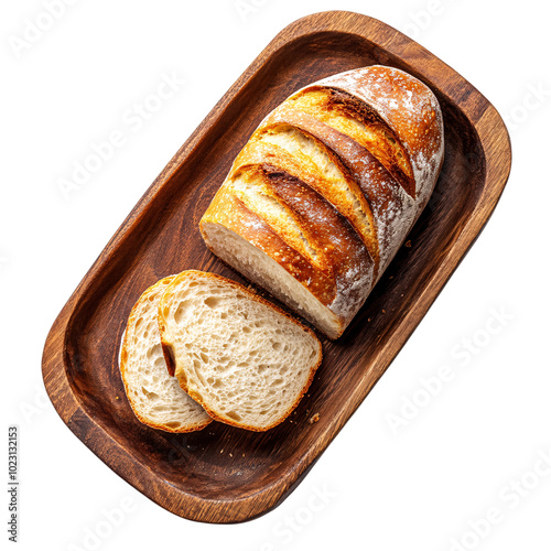 A freshly baked and cut wheat bread on a wooden tray top view on an isolated background