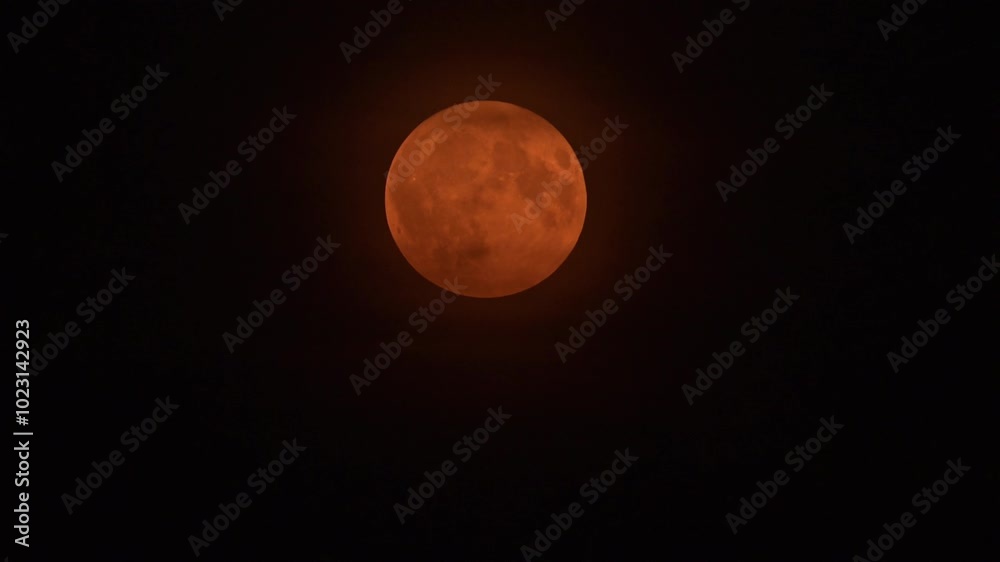 Moon supermoon in the September night sky seen from The Netherlands during a hazy evening. Moon supermoon in the September night sky seen from The Netherlands during a hazy evening.