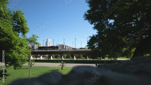 general plan of the bridge with passing cars. bright day. slow motions