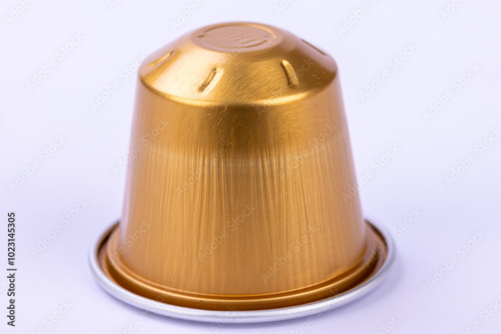 Luxurious Golden Coffee Capsule Isolated Luxurious Golden Coffee Capsule Isolated