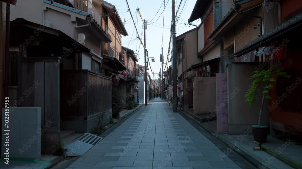 Walking through an empty alley in Kyoto, Japan Walking through an empty alley in Kyoto, Japan