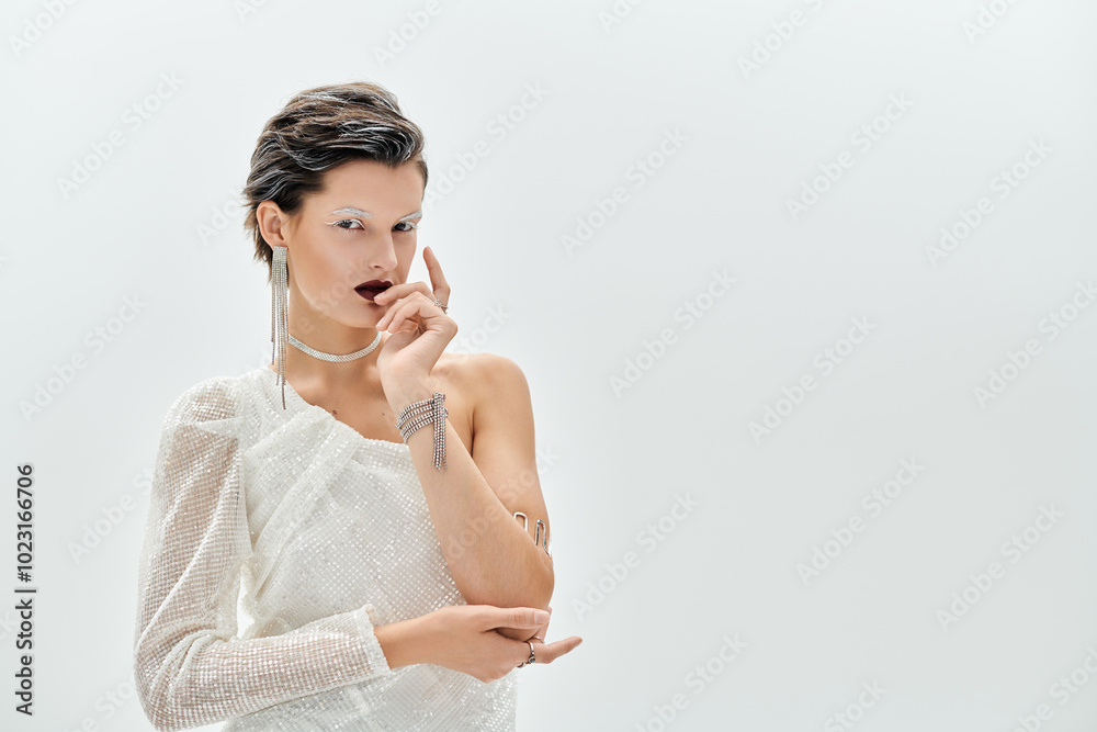 A beautiful woman elegantly poses in cozy winter attire, radiating charm and sophistication. A beautiful woman elegantly poses in cozy winter attire, radiating charm and sophistication.