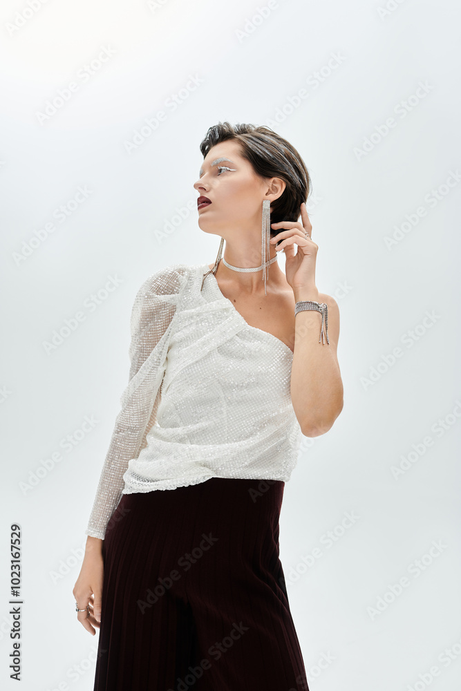 A chic woman showcases her winter style with cozy elegance, exuding sophistication and warmth. A chic woman showcases her winter style with cozy elegance, exuding sophistication and warmth.