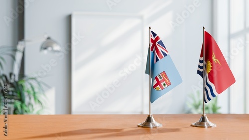 FLAGS OF FIJI AND KIRIBATI ON TABLE photo