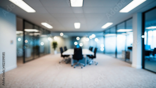 Blurred image of modern office interior with bokeh lights.