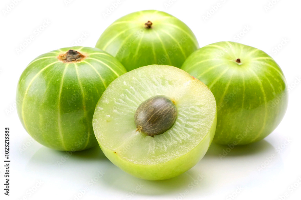 Herbal fresh whole and sliced amla, over white background Herbal fresh whole and sliced amla, over white background