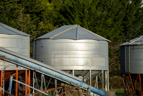 jacky bin and silos for grain on a farm in australia photo