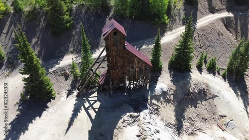 Yankee Girl Mine between Ouray and Silverton, Colorado. High angle wide view of the vertical mine shaft and head frame.