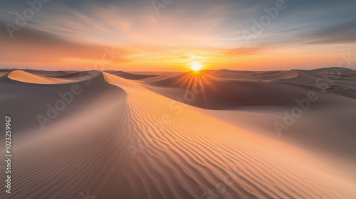 A Breathtaking View of the Sun Setting Over Expansive Desert