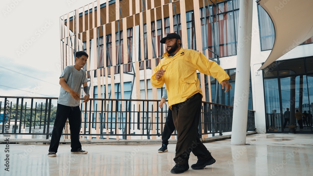 Hip hop team dance break dance while multicultural friend surrounded and clapping hands to cheer or encourage his friend to dance. Active and energetic street dance. Outdoor sport 2024. Hiphop. Hip hop team dance break dance while multicultural friend surrounded and clapping hands to cheer or encourage his friend to dance. Active and energetic street dance. Outdoor sport 2024. Hiphop.