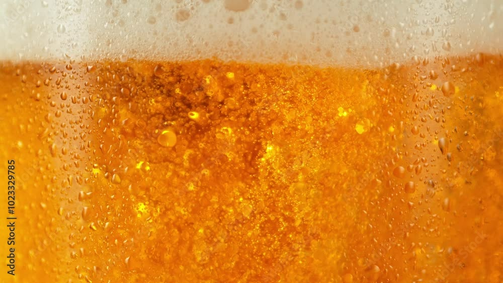 Super slow motion of pouring beer into pint . Filmed on high speed cinema camera, 1000 fps .