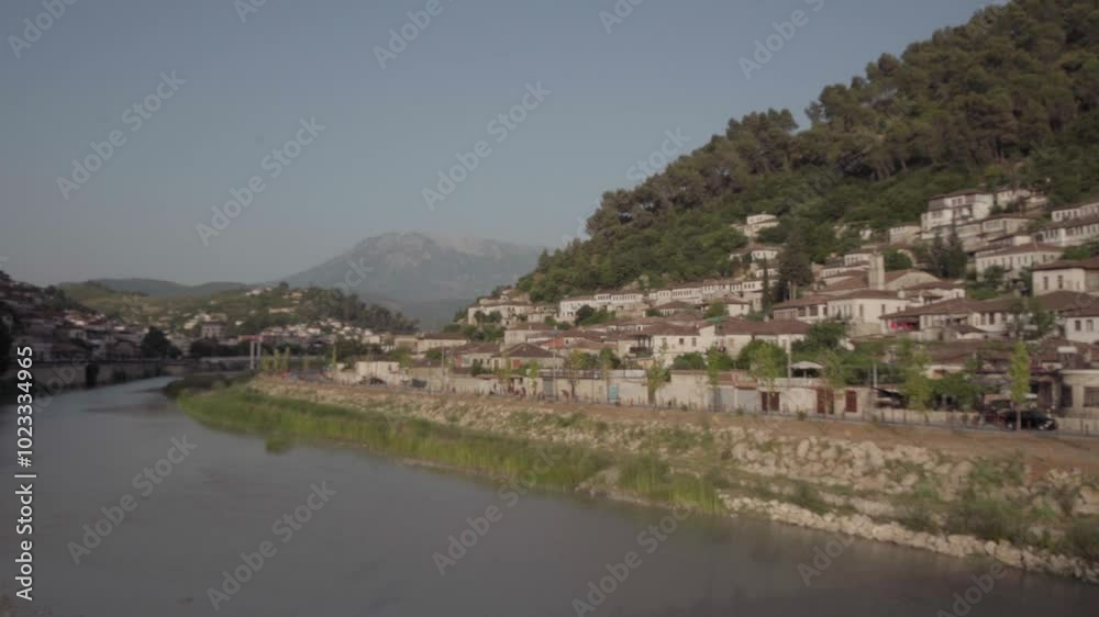 BERAT, ALBANIA, April 13, 2024: Berat castle viewed from boulevard Republika in Albania. BERAT, ALBANIA, April 13, 2024: Berat castle viewed from boulevard Republika in Albania.