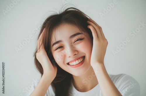 Close-up Portrait of a Smiling Woman with Brown Hair