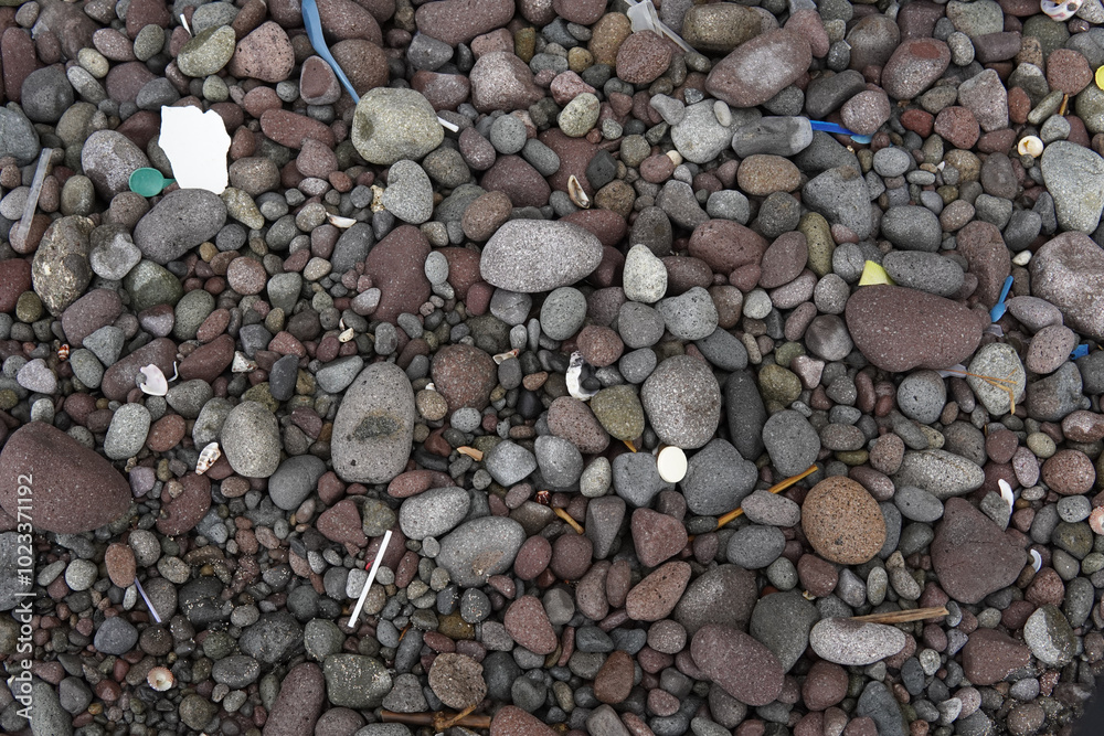 Pebble Beach Texture with Plastic Pollution Pebble Beach Texture with Plastic Pollution