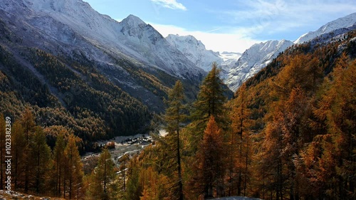 Landscape of the mountains, sky, forest and la Grouille village  in autumn in Switzerland. photo