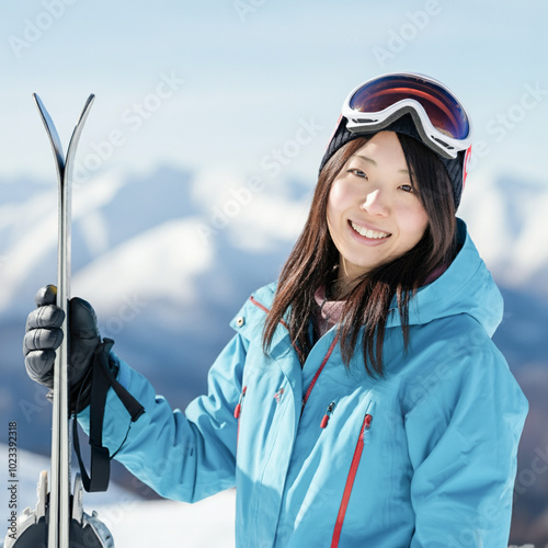 雪山のゲレンデでスキーを楽しむ女性のポートレート photo