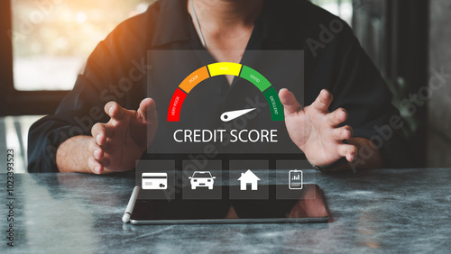 Businessman evaluate customer statistical data with credit score icon. Credit score concept.  Online credit score ranking check. Loan, mortgage and payment cards. photo