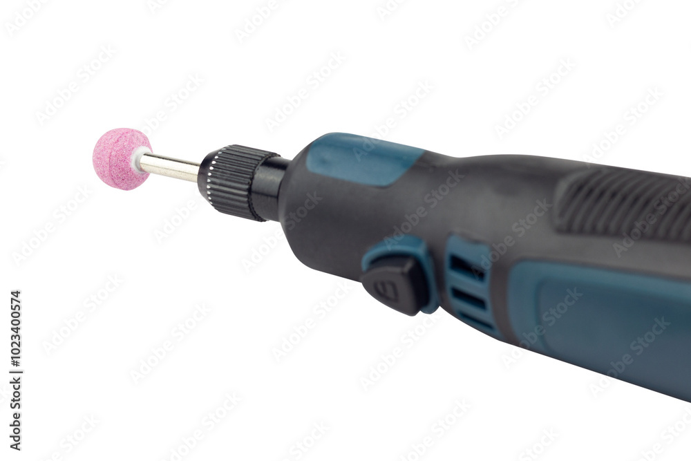 hand engraver with stone cutter, mini hand drill on battery isolated from background hand engraver with stone cutter, mini hand drill on battery isolated from background