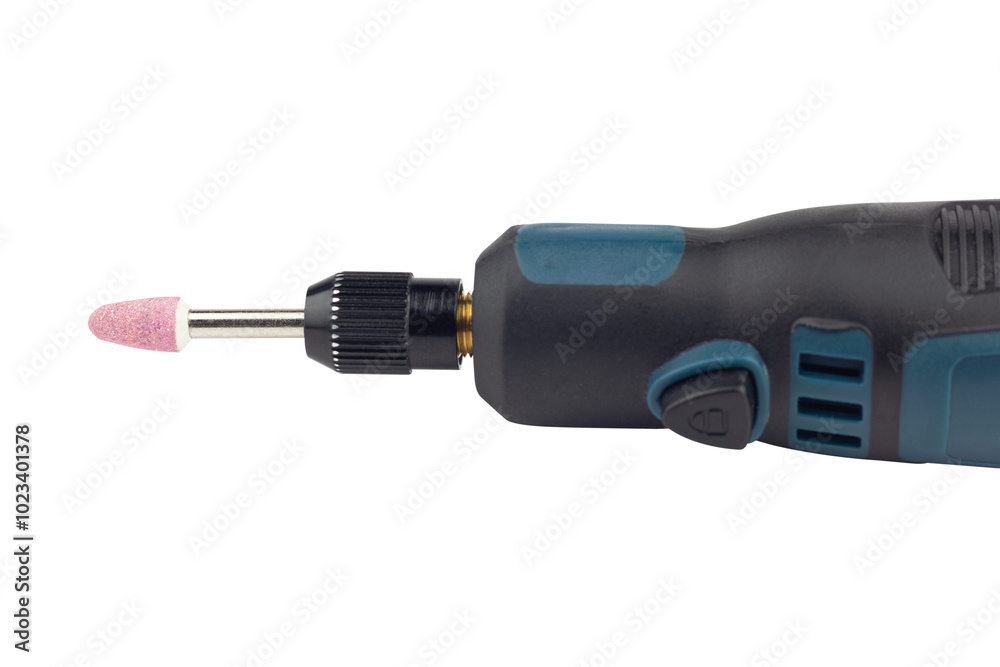 hand engraver with stone cutter, mini hand drill on battery isolated from background hand engraver with stone cutter, mini hand drill on battery isolated from background