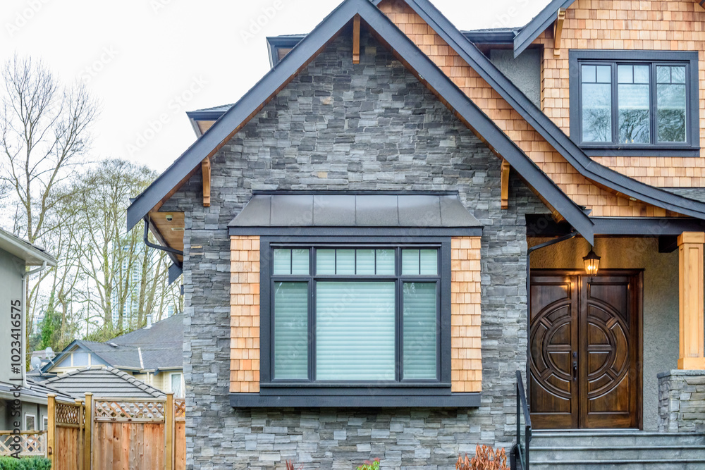 The top of the house or apartment building with nice window. The top of the house or apartment building with nice window.