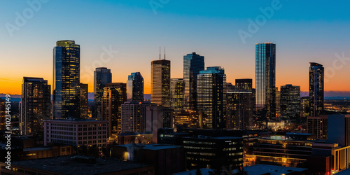 Wallpaper Mural Denver colorado skyline glowing at dusk with vibrant orange and blue sky Torontodigital.ca