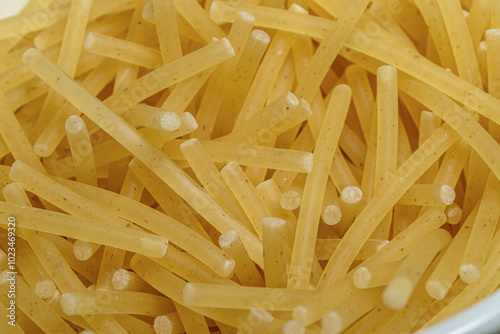 yellow thin vermicelli close up , Italian , texture. photo