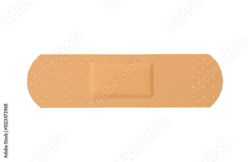 A simple adhesive bandage laid flat on a clean white surface. medical plaster isolated