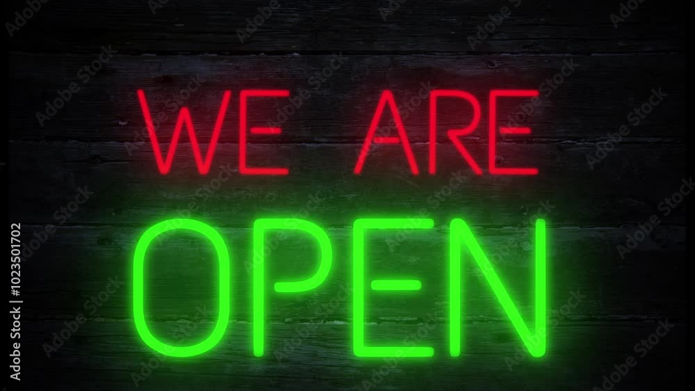 We are open neon effect sign on a dark wooden background We are open neon effect sign on a dark wooden background